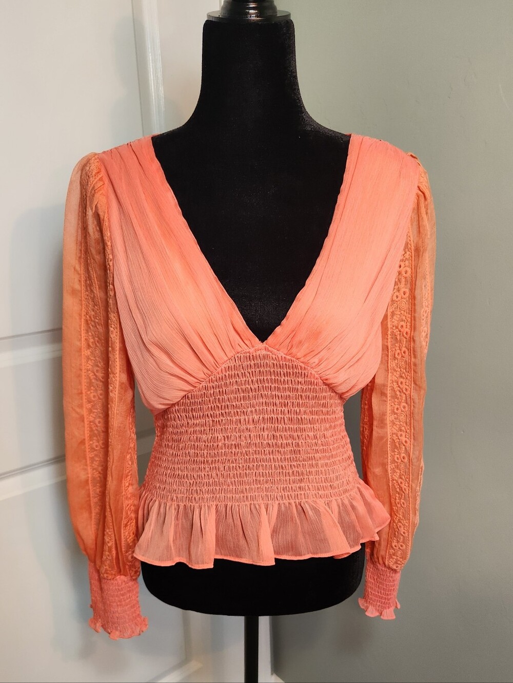 Coral Smocked Peplum V-Neck Blouse with Lace Sleeves